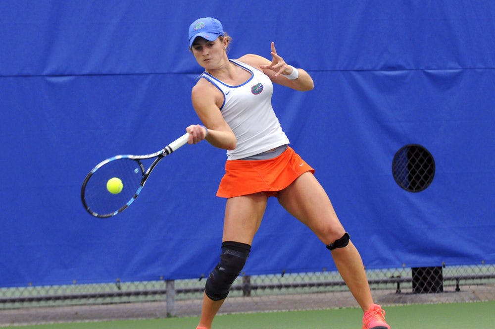 UF's Kourtney Keegan hits a forehand during Florida's 6-1 win over USF on Jan. 27, 2016, at the Ring Tennis Complex.&nbsp;