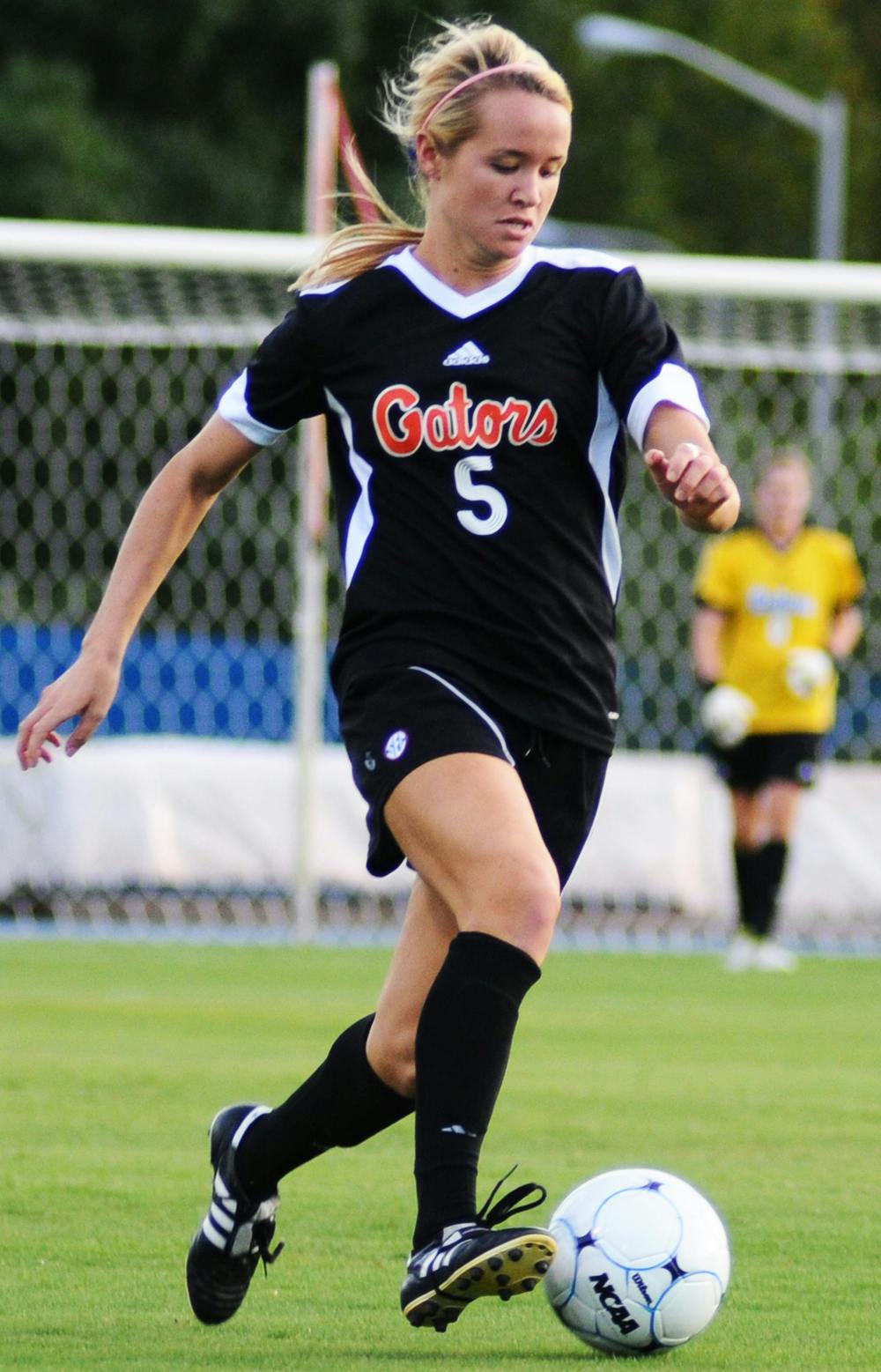Junior defender Maggie Rodgers (5) gets past a Texas Tech defender on Sep. 2, 2011. Rodgers has filled in for injured All-American center back Kat Williamson.