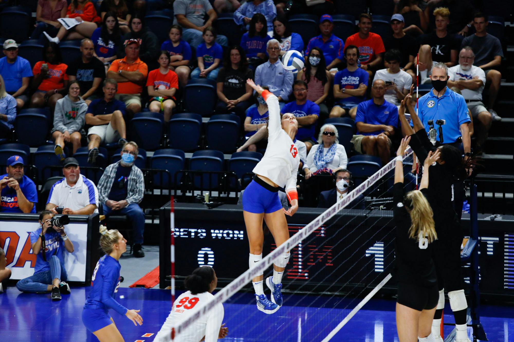 Florida&#x27;s Merritt Beason lays down a kill during a game against Texas A&amp;M on Oct. 16, 2021. Beason laid down a career-high 18 kills against South Carolina, leading the Gators to their first road SEC win of the season. 