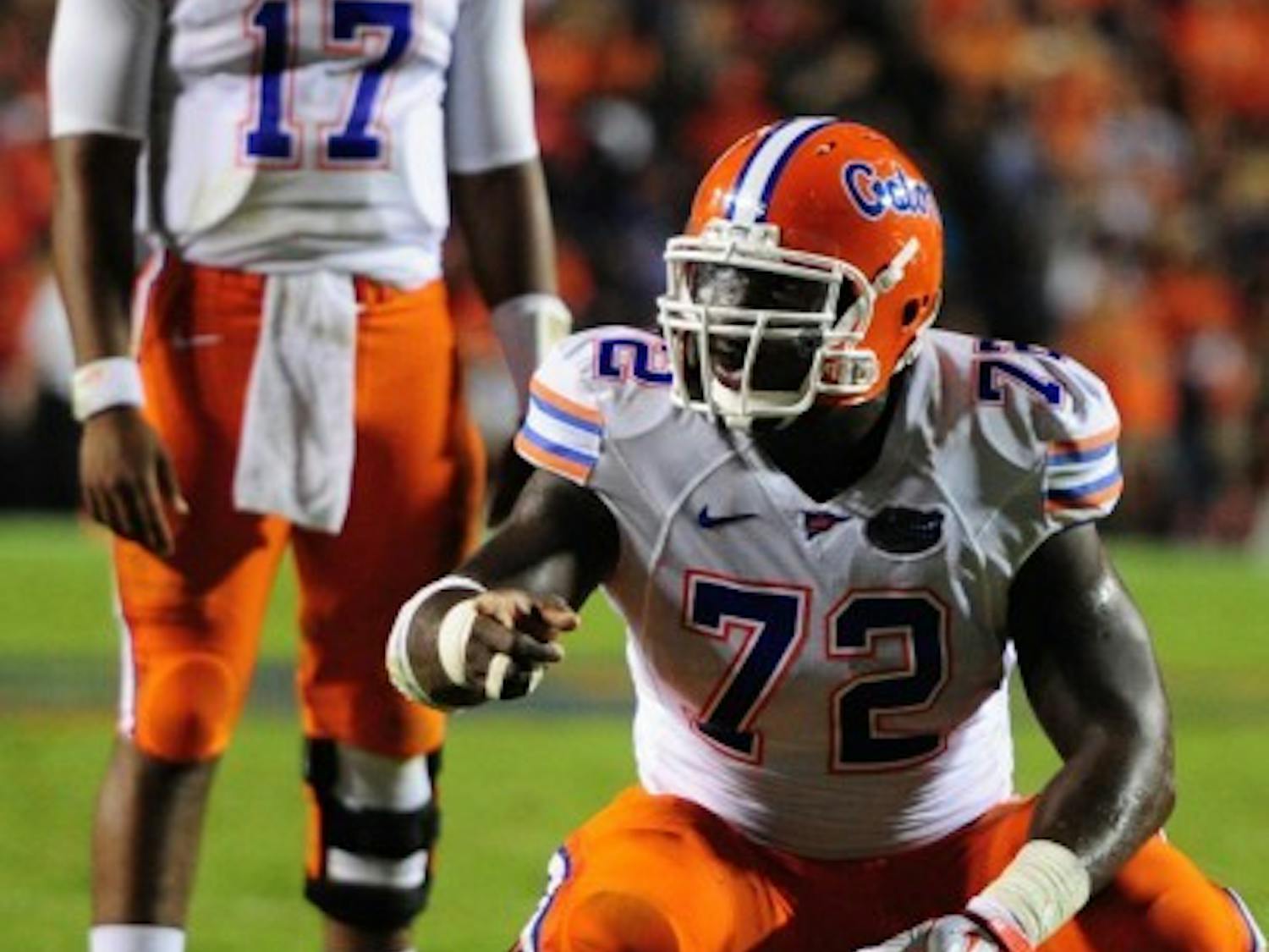 Center Jonotthan Harrison prepares to snap the ball to quarterback Jacoby Brissett at Auburn on Oct. 22 last season.