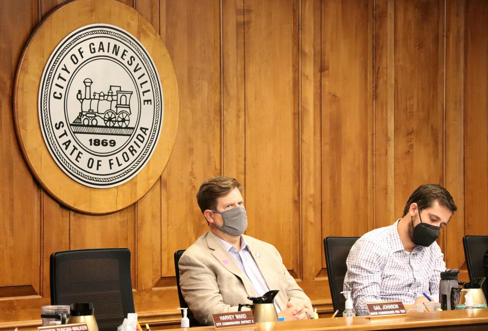 Gainesville Mayor Lauren Poe (left) and City Commissioner Adrian Hayes-Santos (right) listen to public comment at a City Commission meeting on Monday, Sept. 27, 2021.