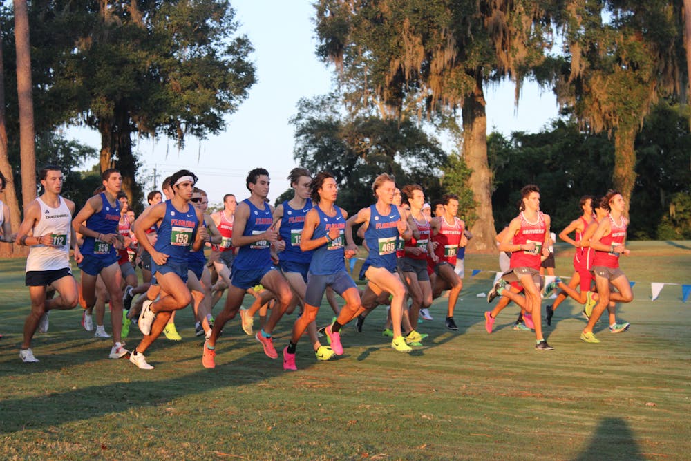 The Gators men’s cross country team runs in the Mountain Dew Invitational on Sept. 15, 2023.