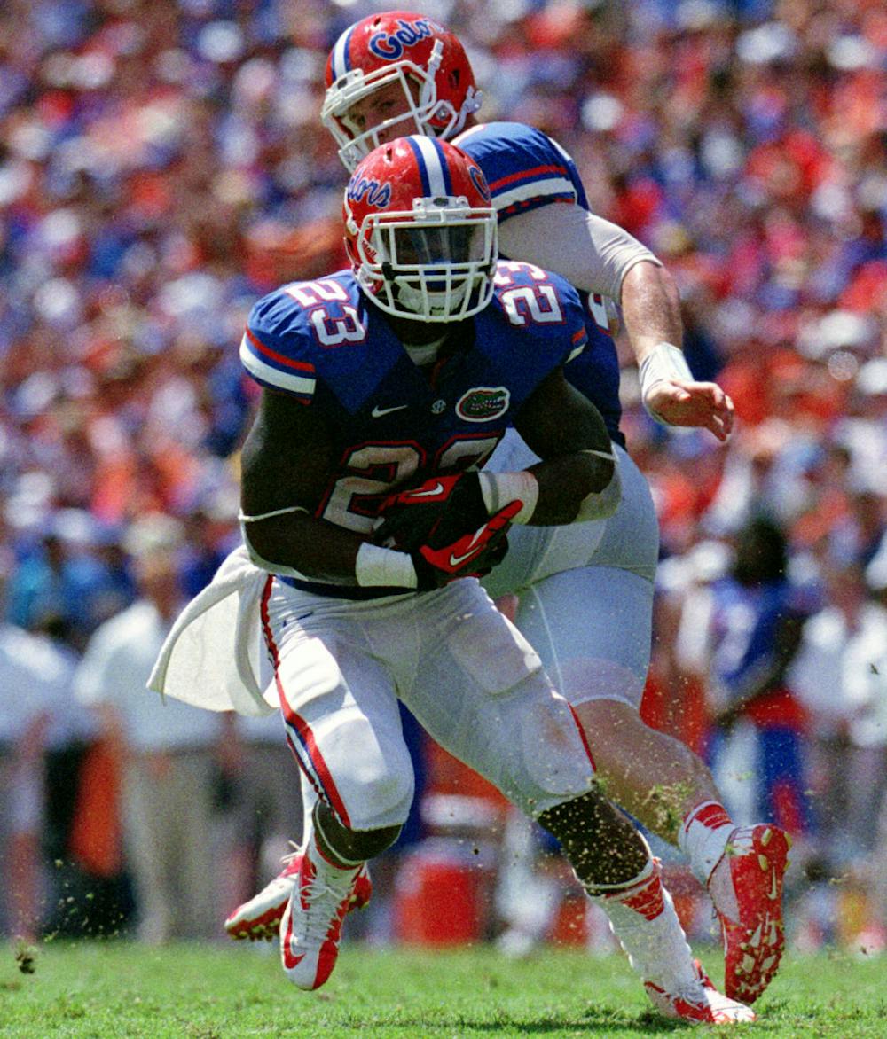 <p>Senior running back Mike Gillislee receives a handoff from sophomore quarterback Jeff Driskel during Florida's 38-0 win against Kentucky on Sept. 22 in Ben Hill Griffin Stadium. Gillislee ran for 56 yards on 13 carries.</p>