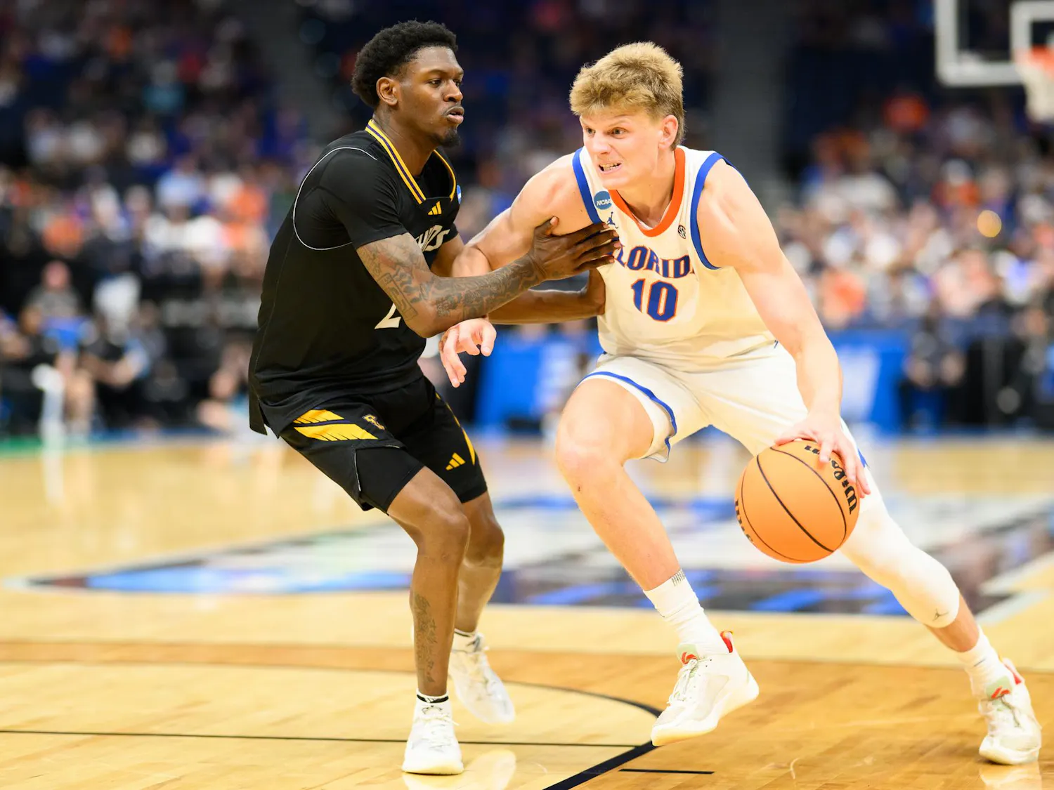 Florida forward Thomas Haugh (10) drives during the second half of an NCAA Tournament first round game against Prairie View A&M, Friday, March 20, 2026, in Tampa, Fla.