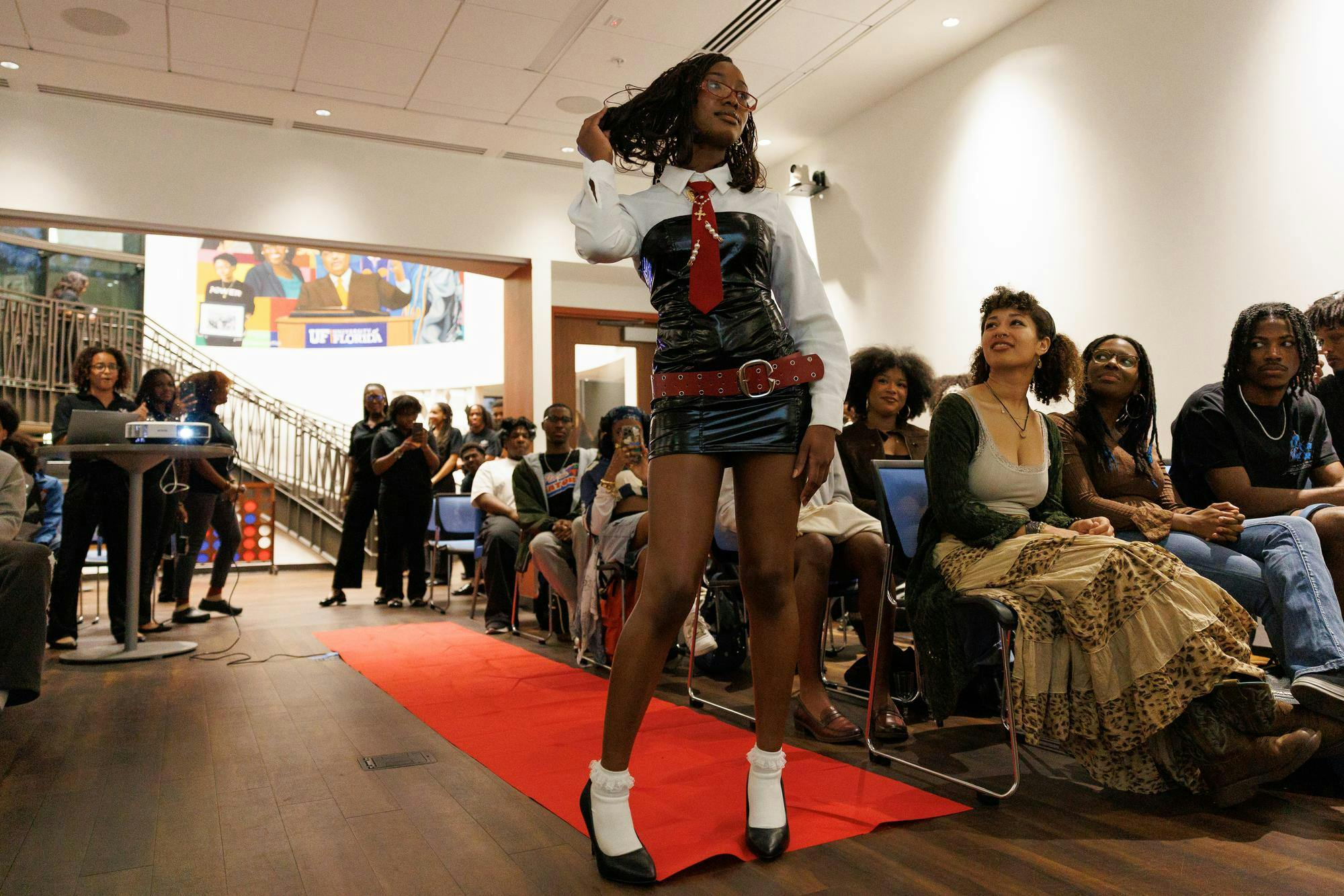 Eden-Rose Parkinson walks the runway at the Cut Different event hosted by the Leadership Development Institute at the Institute of Black Culture at the University of Florida, Friday, Feb. 20, 2026.