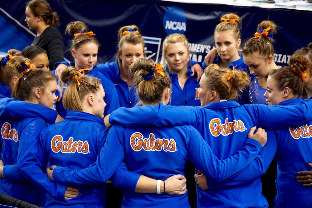 <p>The Florida gymnastics team huddles after finishing fourth at the NCAA Gymnastics Super Six on April 16, 2016, in Fort Worth, Texas.</p>