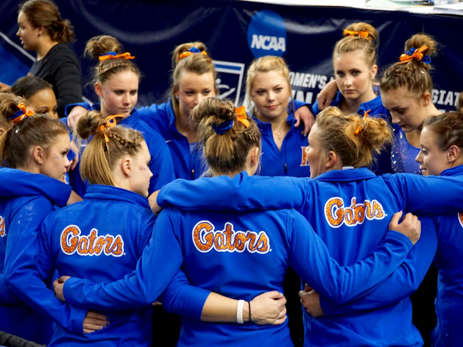 The Florida gymnastics team huddles after finishing fourth at the NCAA Gymnastics Super Six on April 16, 2016, in Fort Worth, Texas.