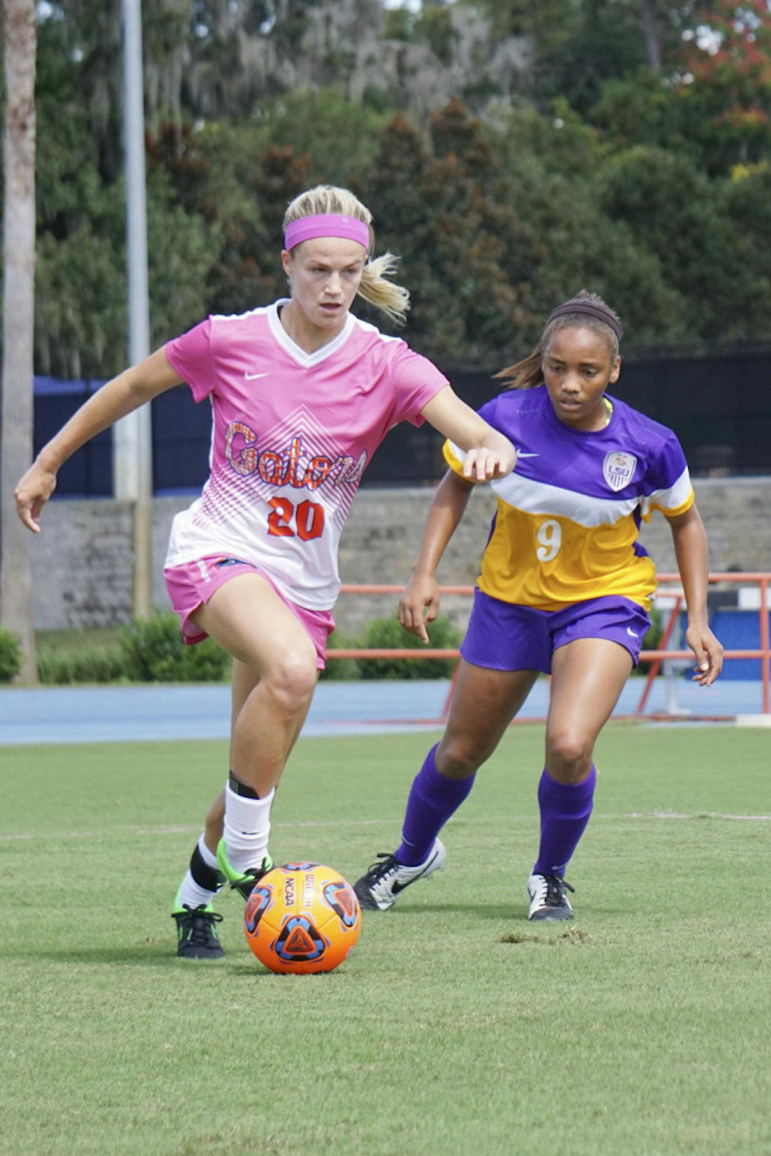 UF defender Christen Westphal dribbles during Florida&#x27;s 2-1 win against LSU on Oct. 11, 2015, at James G. Pressly Stadium. Wespthal now plays right-back for the Portland Thorns and is one of six former Gators playing professionally in the NWSL. 