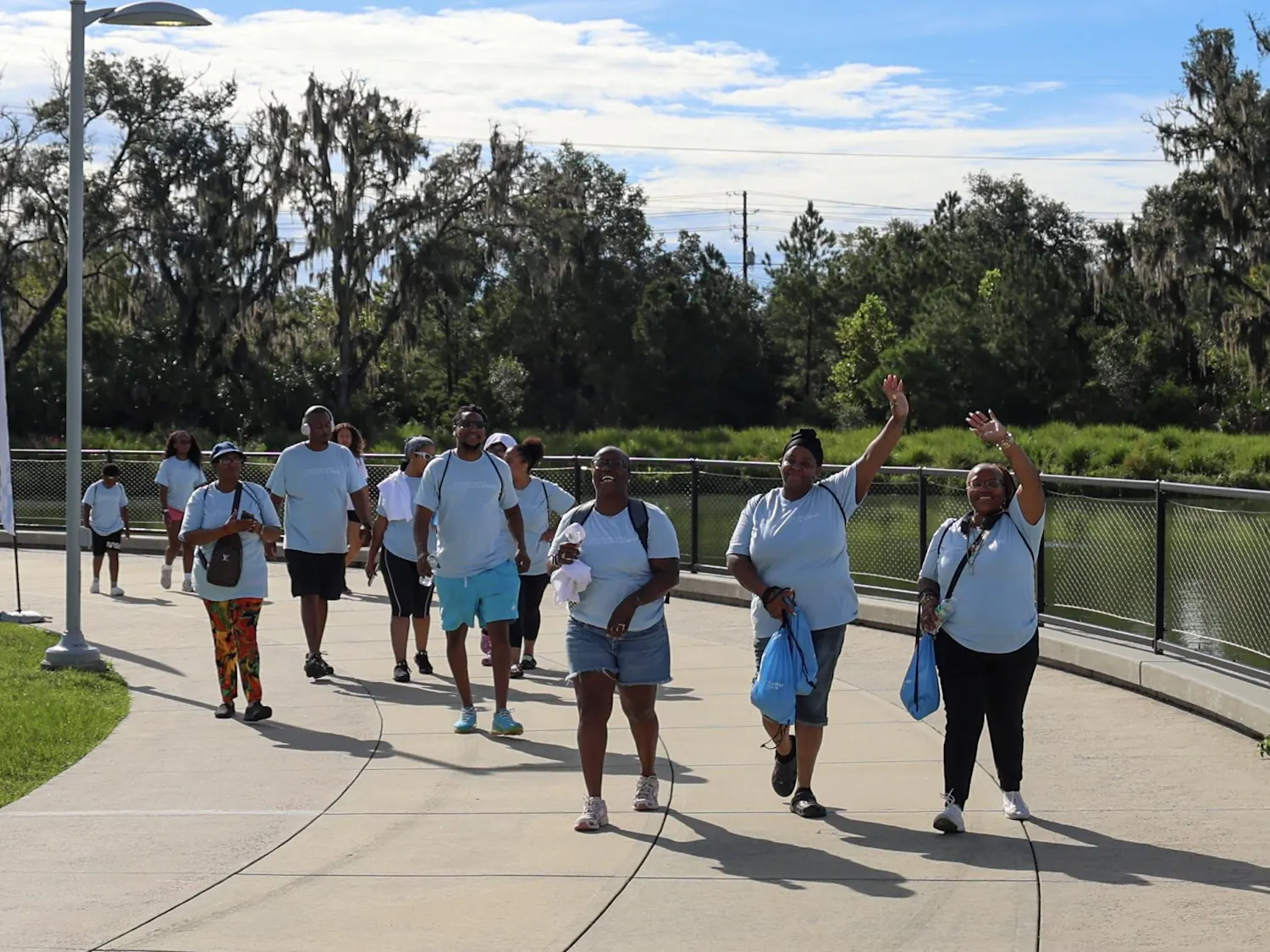 A group of about 12 people walk at the 2026 Sickle Cell Walk, Monday, Sept. 7, 2026 in Gainesville, Fla.
