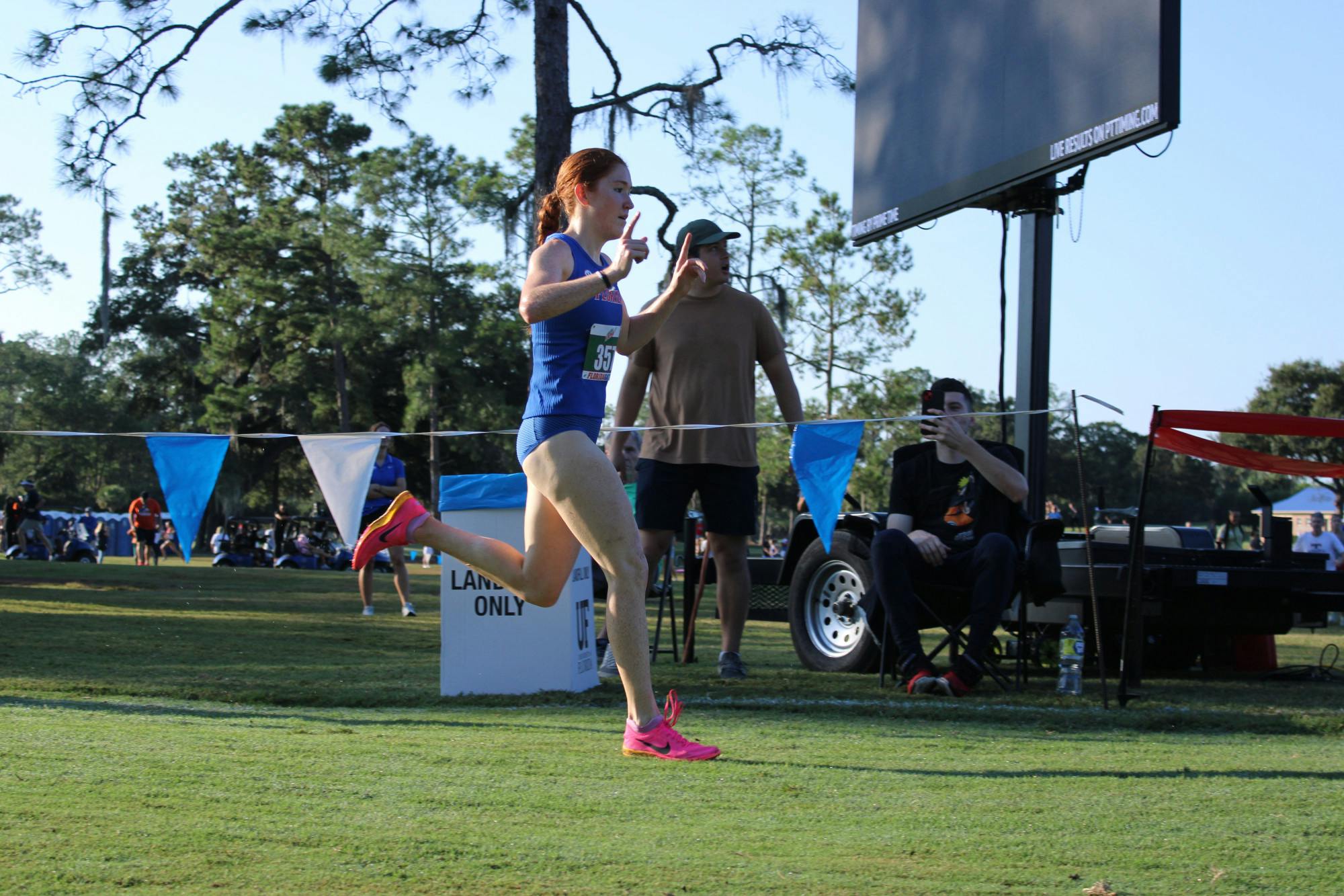 Redshirt senior Allison Wilson points to the sky after she finished first for the Florida Gators in the Mountain Dew Invitational at Mark Bostick Golf Course on Friday, Sept. 15, 2023.
