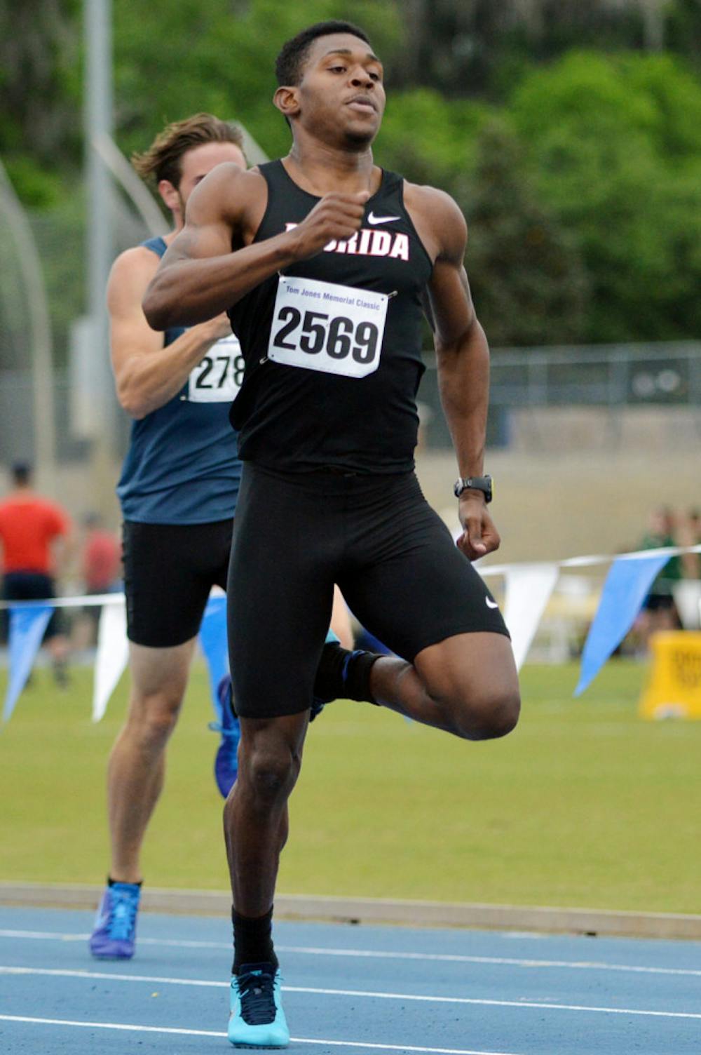<p>Dedric Dukes races in the 400-meter dash at the Tom Jones Memorial on April 19 at the Percy Beard Track. Dukes set personal-best marks in every event he competed in during the 2014 season and help break the school's 4x400-meter relay record.</p>