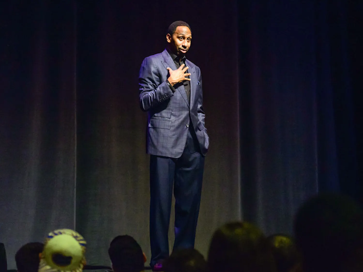 ESPN columnist, sports analyst and radio host Stephen A. Smith speaks to students at the Phillips Center for the Performing Arts on Nov. 12, 2014.