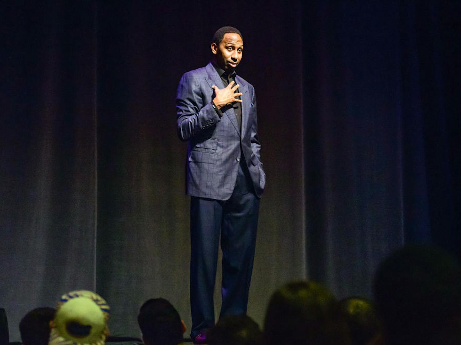 ESPN columnist, sports analyst and radio host Stephen A. Smith speaks to students at the Phillips Center for the Performing Arts on Nov. 12, 2014.