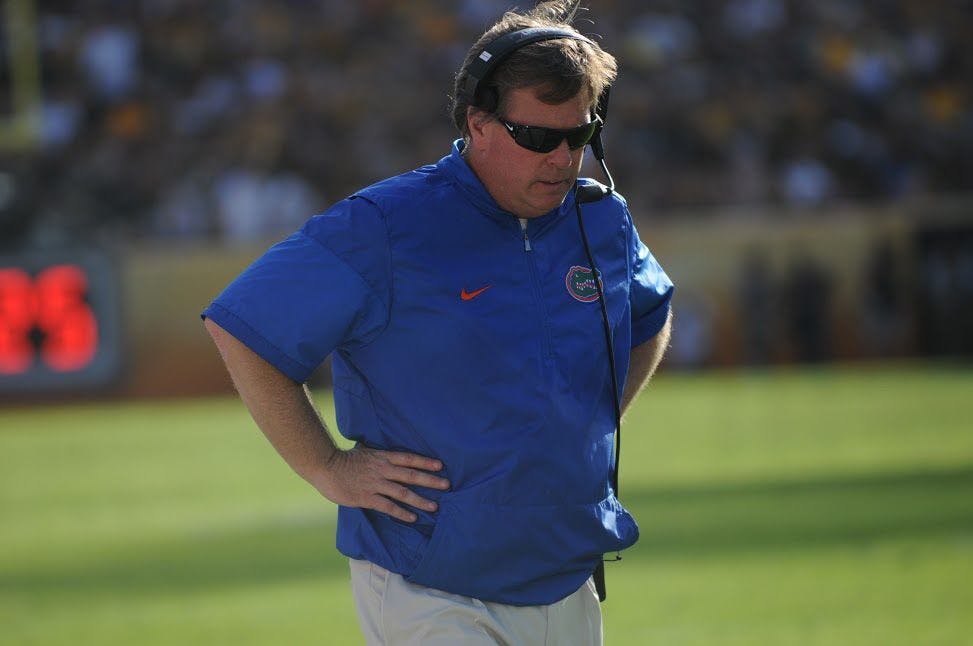 UF coach Jim McElwain looks down in disapproval during Florida's 30-3 win over Iowa in the Outback Bowl on Jan. 2, 2017, at Raymond James Stadium in Tampa.&nbsp;