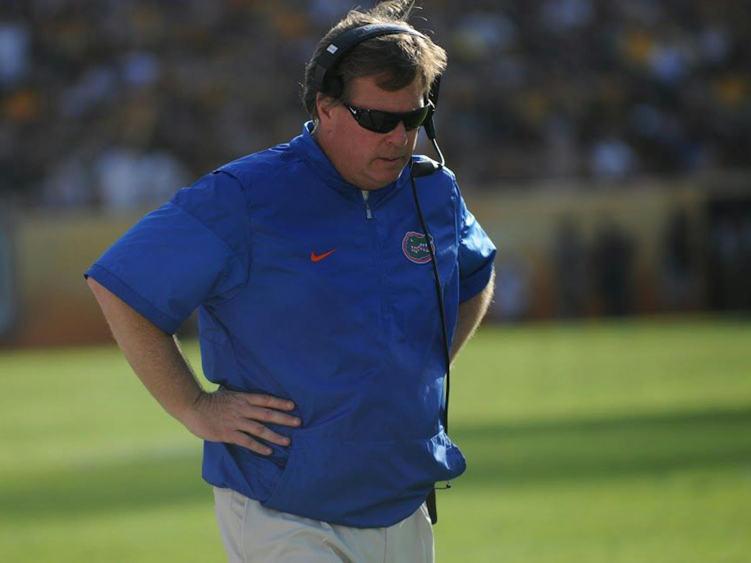 UF coach Jim McElwain looks down in disapproval during Florida's 30-3 win over Iowa in the Outback Bowl on Jan. 2, 2017, at Raymond James Stadium in Tampa. 