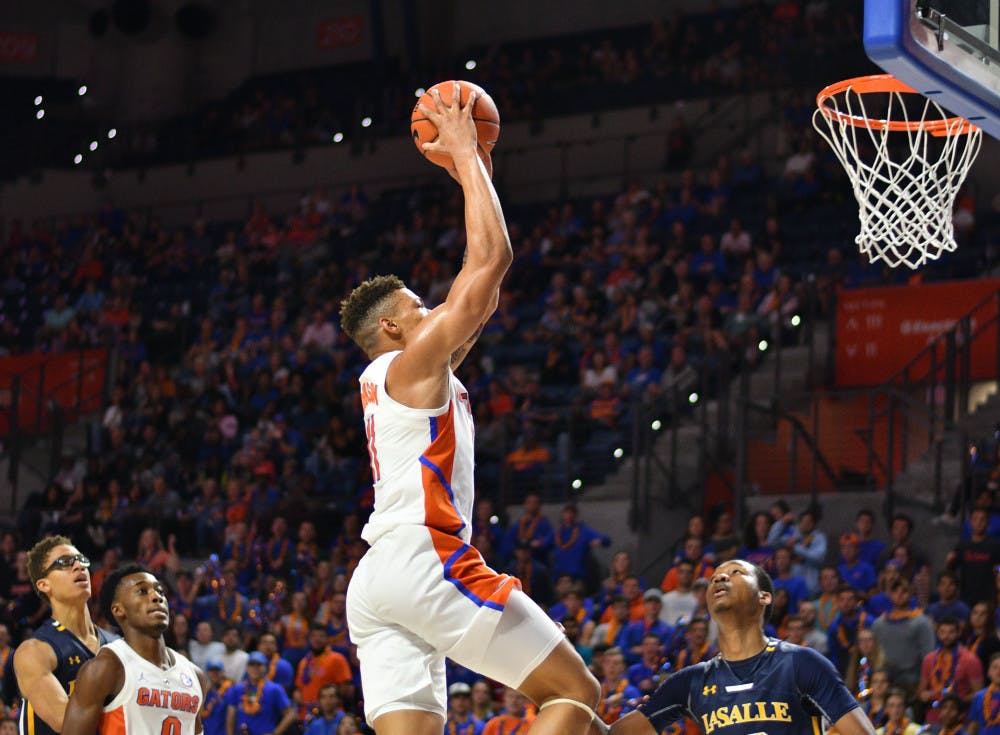 <p>Forward Keyontae Johnson elevates for his thundering dunk against La Salle with 13:40 in the second half. He finished UF's 82-69 victory with 12 points and three rebounds. </p>