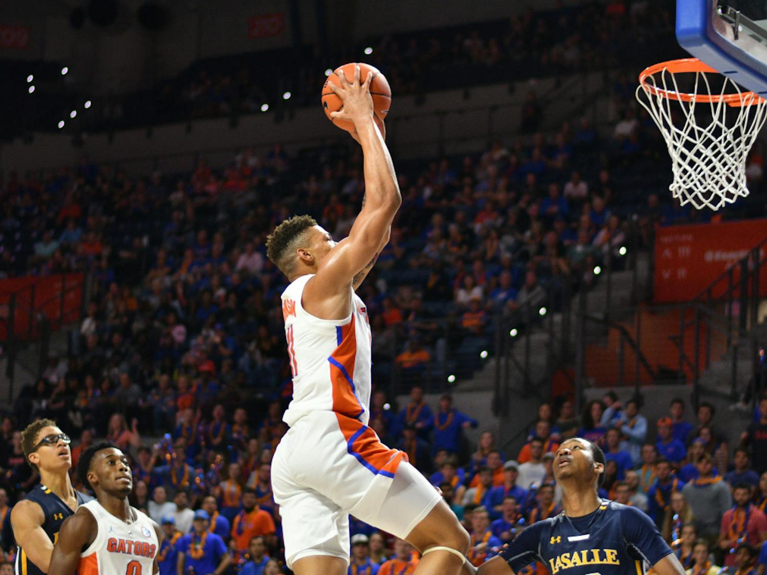 Forward Keyontae Johnson elevates for his thundering dunk against La Salle with 13:40 in the second half. He finished UF's 82-69 victory with 12 points and three rebounds.