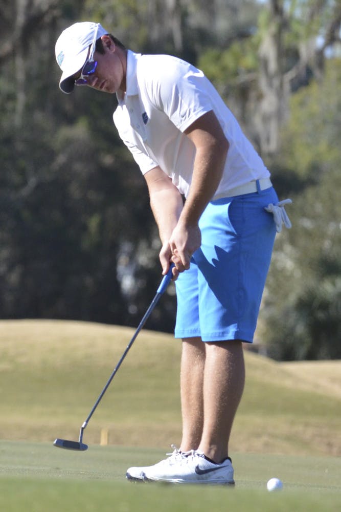 Sam Horsfield watches his ball roll toward the cup during Day 1 of the SunTrust Gator Invitational on Feb. 20, 2016, at the Mark Bostick Golf Course.