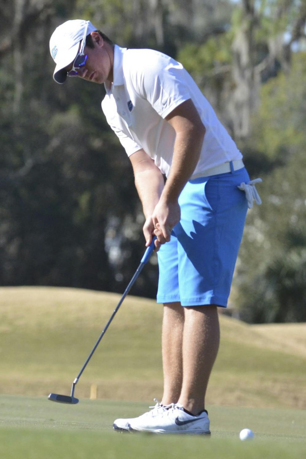 <p>Sam Horsfield watches his ball roll toward the cup during Day 1 of the SunTrust Gator Invitational on Feb. 20, 2016, at the Mark Bostick Golf Course.</p>