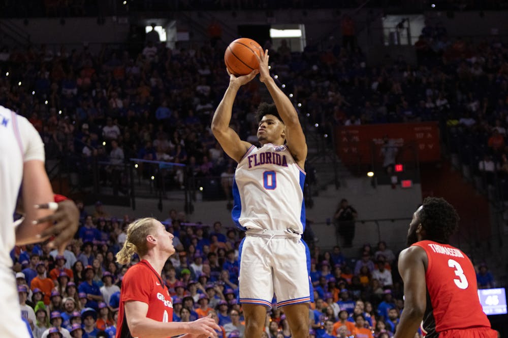 Gators men's basketball guard Zyon Pullin shoots a jump shot in the team's 102-98 win over the Georgia Bulldogs on Saturday, January 27, 2024. 