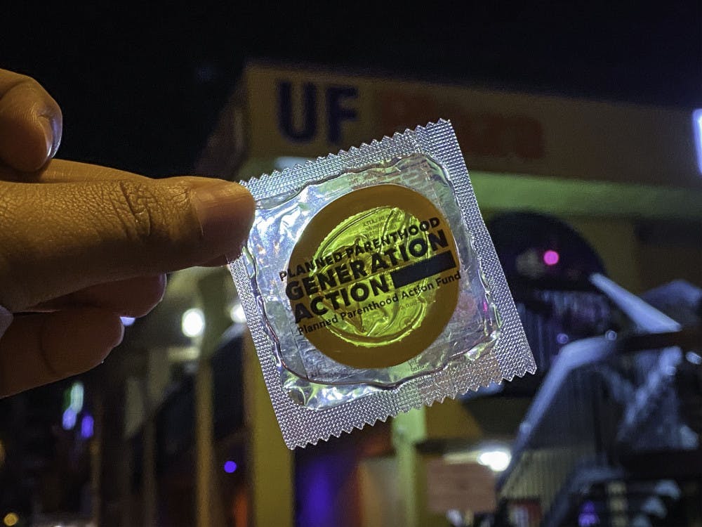 <p>On Saturday night, Planned Parenthood Generation Action and the Women’s Student Association handed out condoms and other forms of protection to those in lines for bars at Midtown.</p>