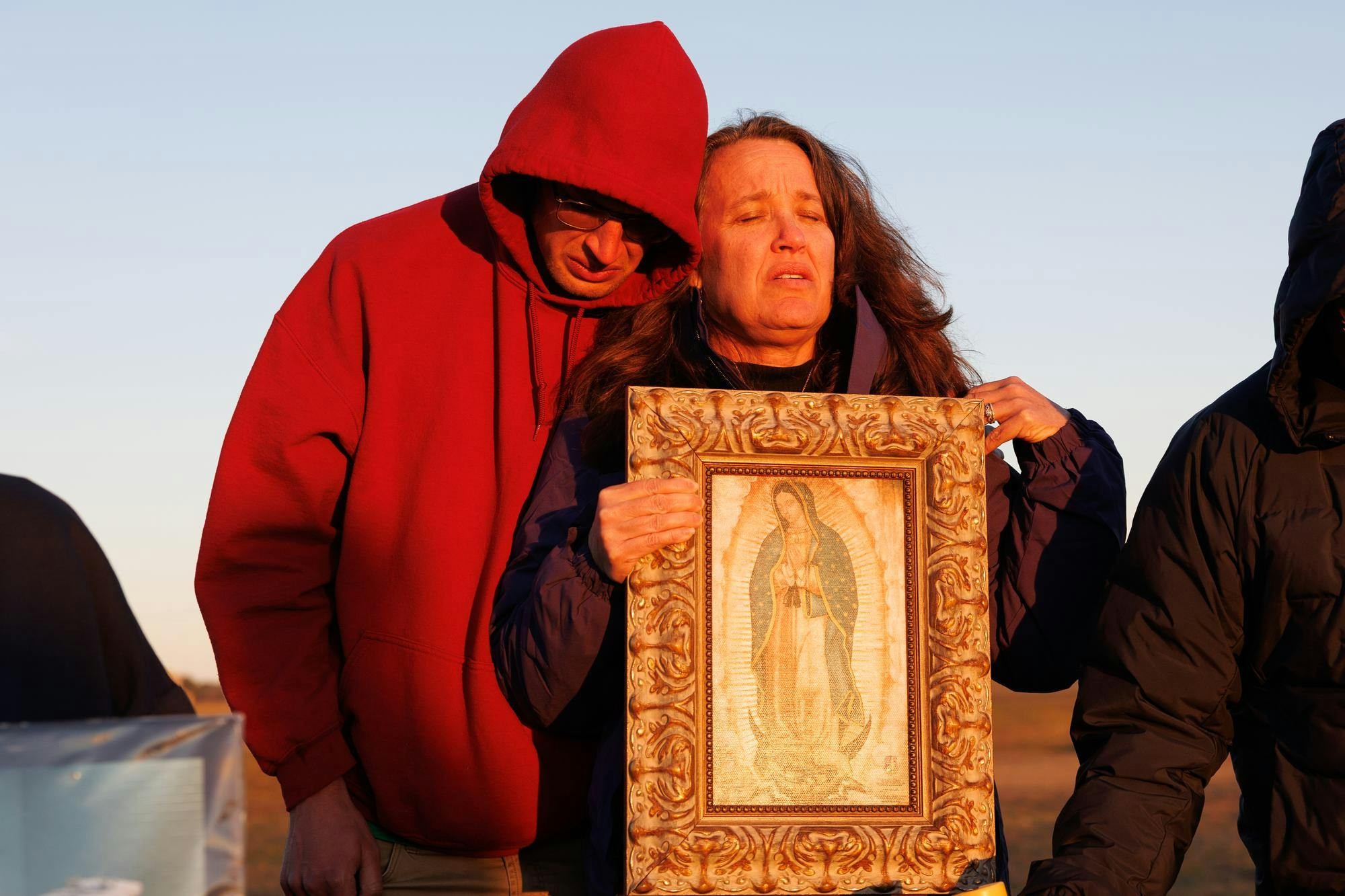 Matthew Ryan and Geralyn Mackritis, son and mother, hold eachother in prayer in opposition to the execution of Melvin Trotter. Trotter was executed at the Florida State Prison in Raiford, Tuesday, Feb. 24, 2026.