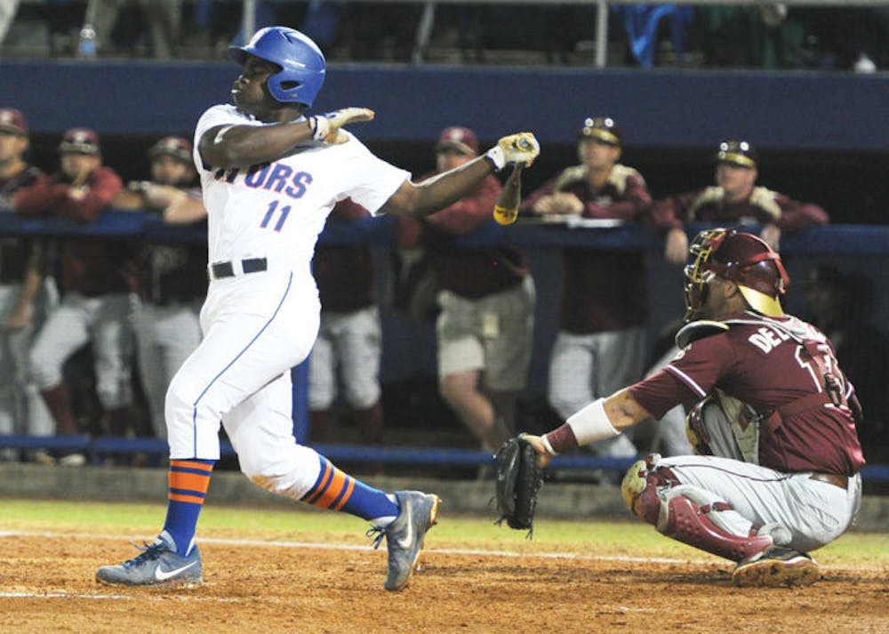 <p>Josh Tobias bats during Florida’s 3-1 win against Florida State on March 18.</p>