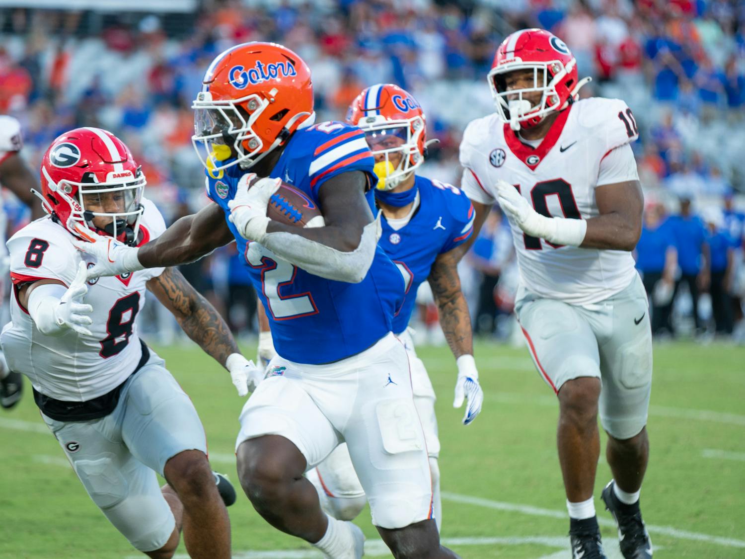 Running back Montrell Johnson rumbles through the defense in the Gators’ 43-20 loss against the Georgia Bulldogs on Saturday, Oct. 28, 2023.