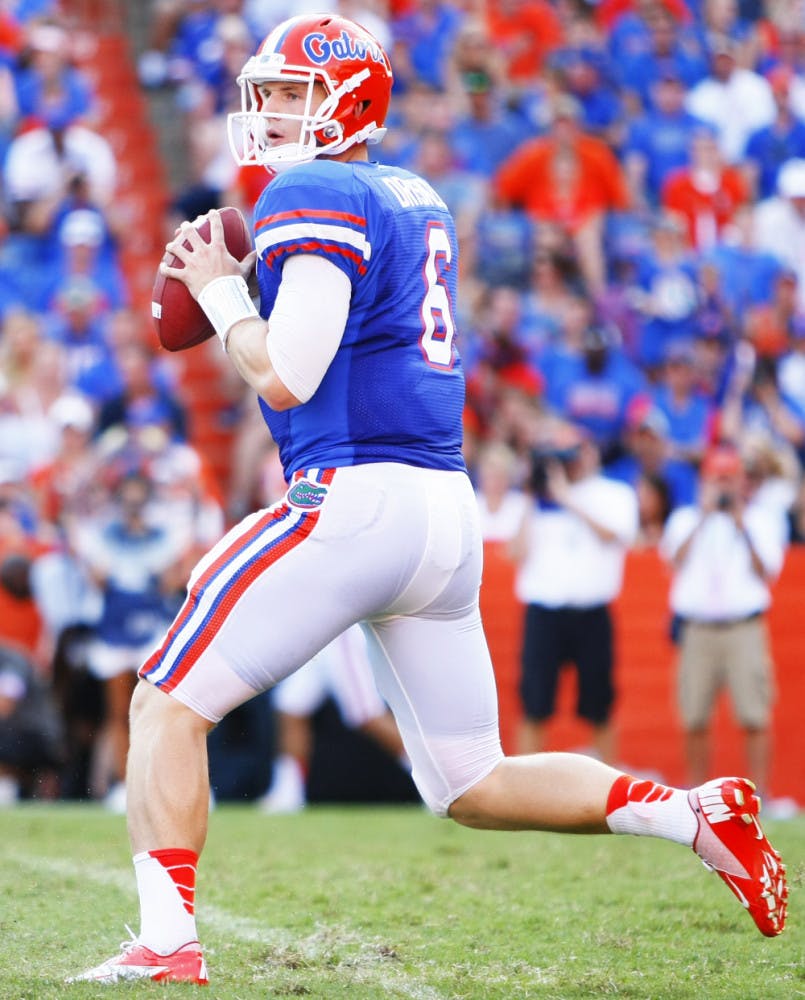 Jeff Driskel (6) takes a snap in shotgun during Saturdays win against Bowling Green University at Ben Hill Griffin Stadium.
