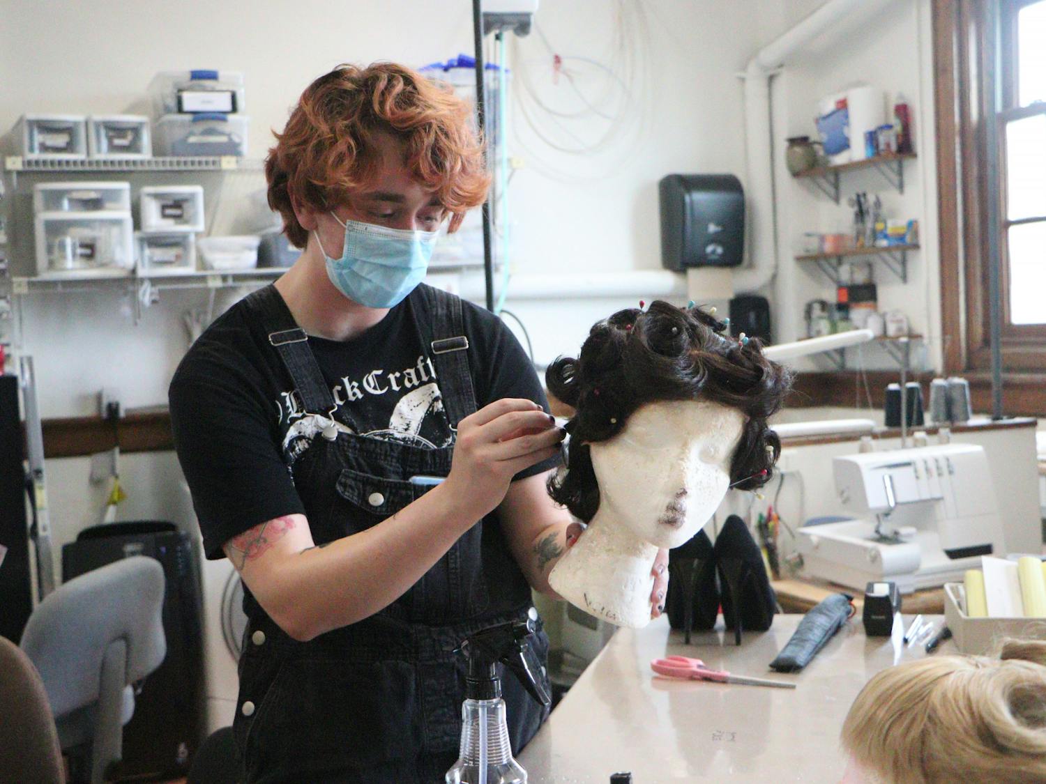 Mason Baria prepares a wig for the Hippodrome’s production of &quot;Fahrenheit 451&quot; Wednesday, Sep. 14, 2022. 