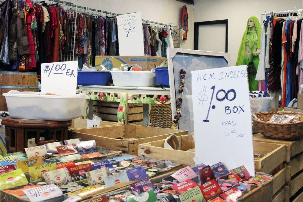 <p dir="ltr">A sign inside Gypsy Palace on 4000 W. Newberry Road displays price cuts put in place by the store’s clearance sale. The store, which has been open for almost 14 years, will close sometime in the next couple weeks.</p>