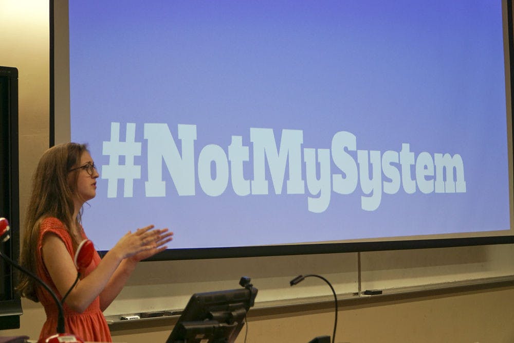 Sabrina Philipp takes questions during the Not My System town hall meeting at Turlington Hall on Feb. 16, 2016. On Tuesday, she hosted an online Q&amp;A.