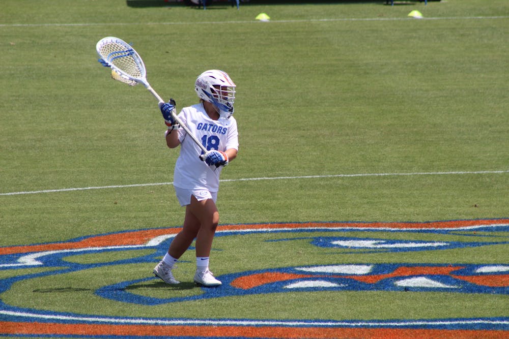 <p>Redshirt sophomore Sarah Reznick, from Long Beach, New York, forwards the ball to midfield in a home matchup with the Liberty Flames. Reznick was named to the AAC All-Tournament team.</p>