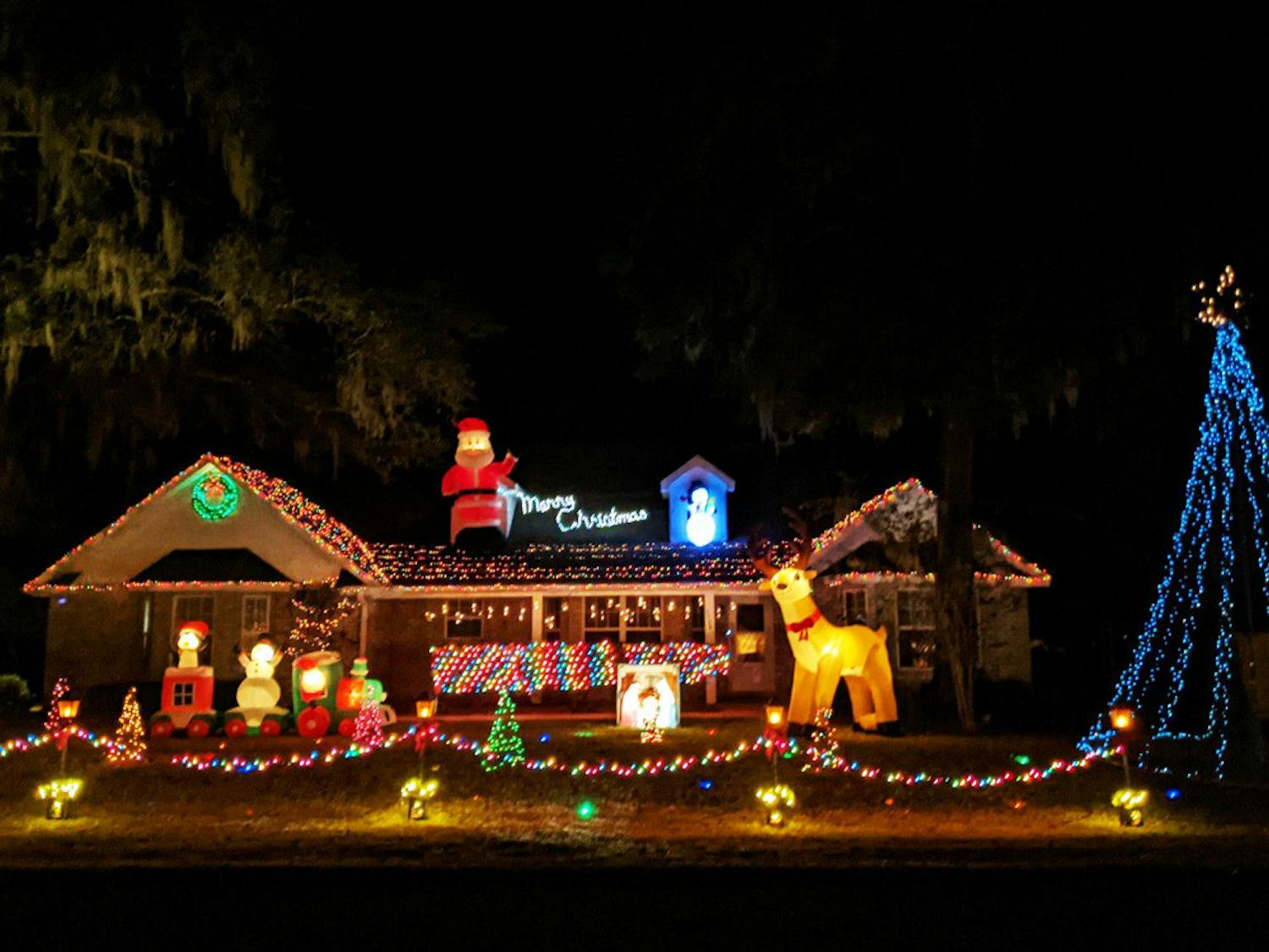 Logan Euler, 19, runs a light show at his dad&#x27;s house in Newberry, Fla. Starting Dec. 3, 2020, cars can tune into a radio station as they drive by to hear the curated music and messages from the show every night  from 6-9 p.m. Sunday-Thursday and 6 p.m. to 12 a.m. on Fridays and Saturdays. 