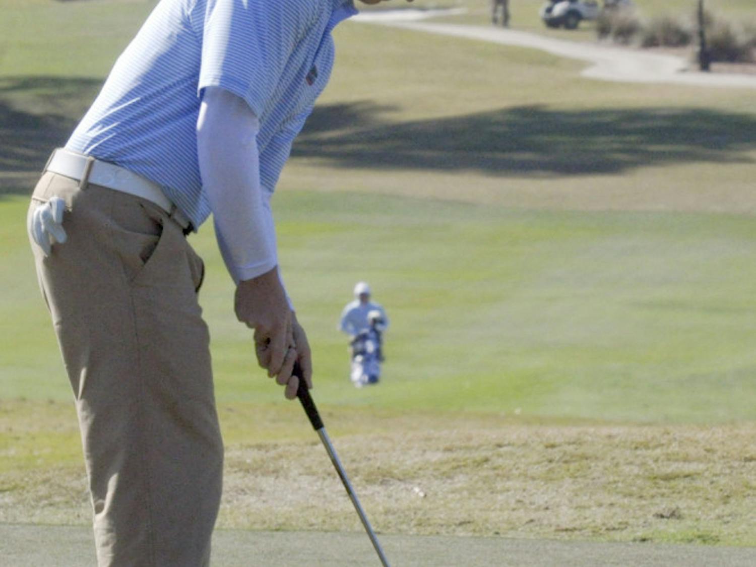 Eric Banks putts during the first day of the SunTrust Gator Invitational on Feb. 14.