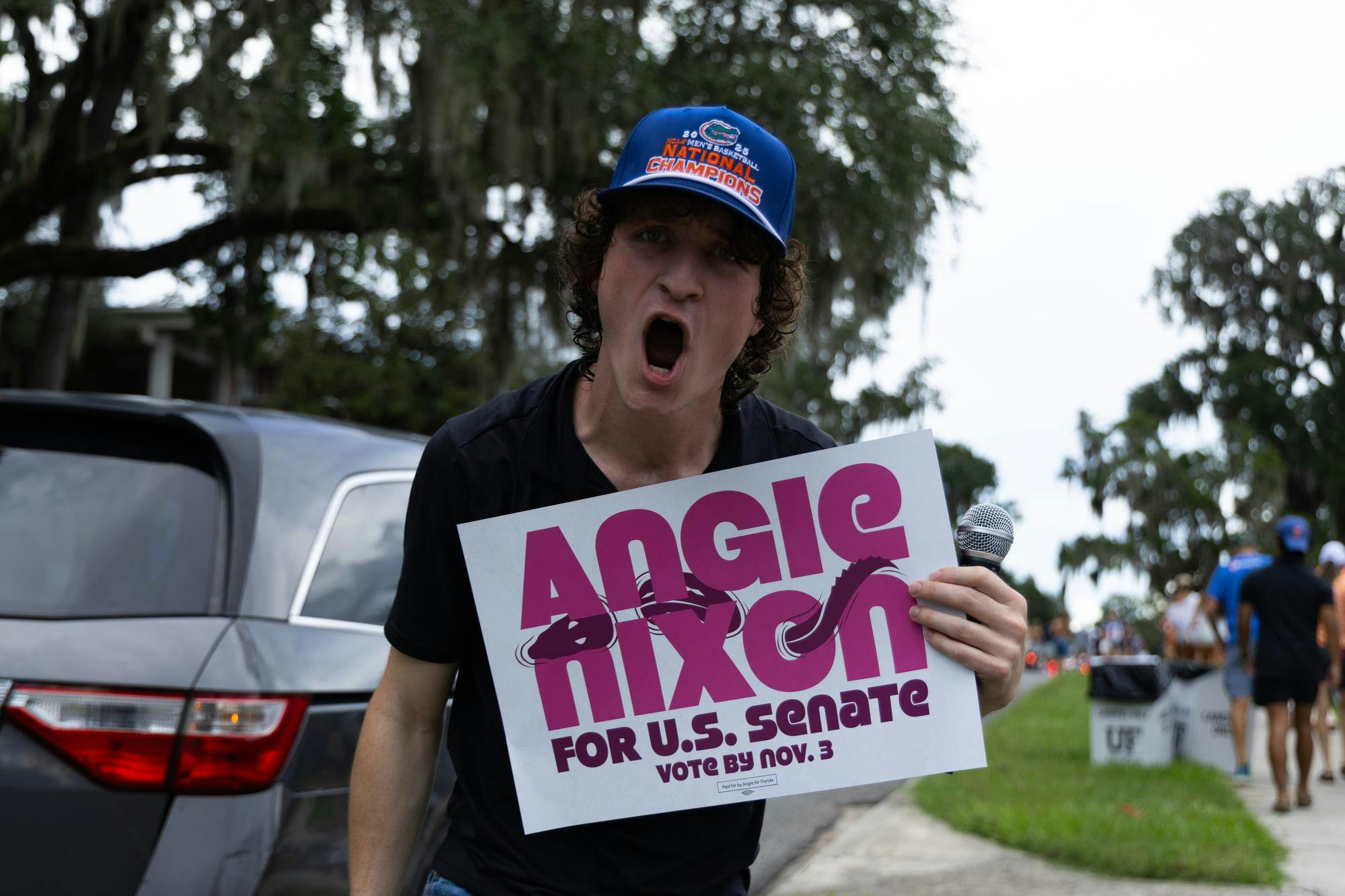 Zander Moricz shouts in support of Angie Nixon. Moricz has worked in the Angie Nixon campaign since Nixon won the Democratic nomination in the Florida primary for Senate, and has been on a gap from Harvard since 2022 to organize youth advocacy.