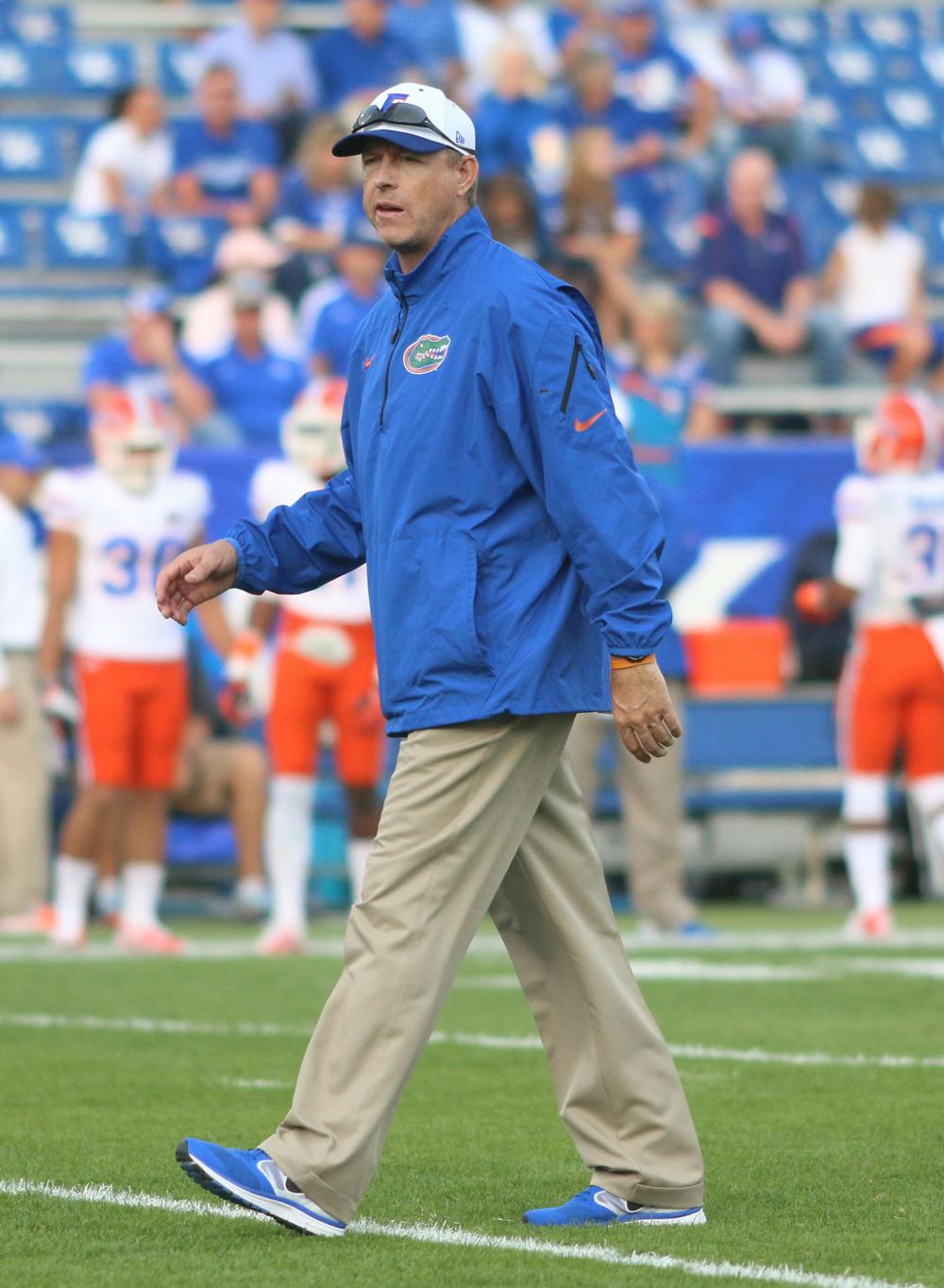 <p>Brent Pease walks on the field and watches warm-ups prior to Florida’s 24-7 victory against Kentucky on Saturday at Commonwealth Stadium in Lexington, Ky. Florida’s second-year offensive coordinator took the Gators’ quarterbacks for a nature walk near their hotel prior to the game.</p>
