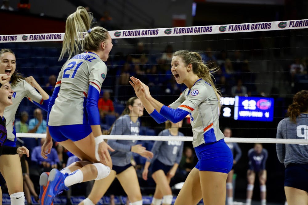 <p><span id="docs-internal-guid-a2cfcc26-7fff-cd2e-bf78-f135a475bf44"><span>Redshirt junior opposite attacker Holly Carlton (right) and sophomore setter Marlie Monserez (left) combined for 46 assists on Saturday against the Texas A&amp;M Aggies.</span></span></p>
