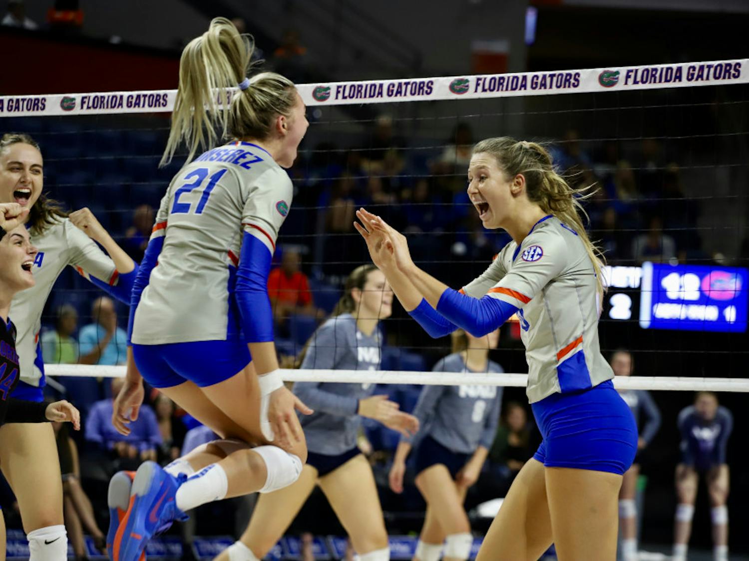 Redshirt junior opposite attacker Holly Carlton (right) and sophomore setter Marlie Monserez (left) combined for 46 assists on Saturday against the Texas A&amp;M Aggies.