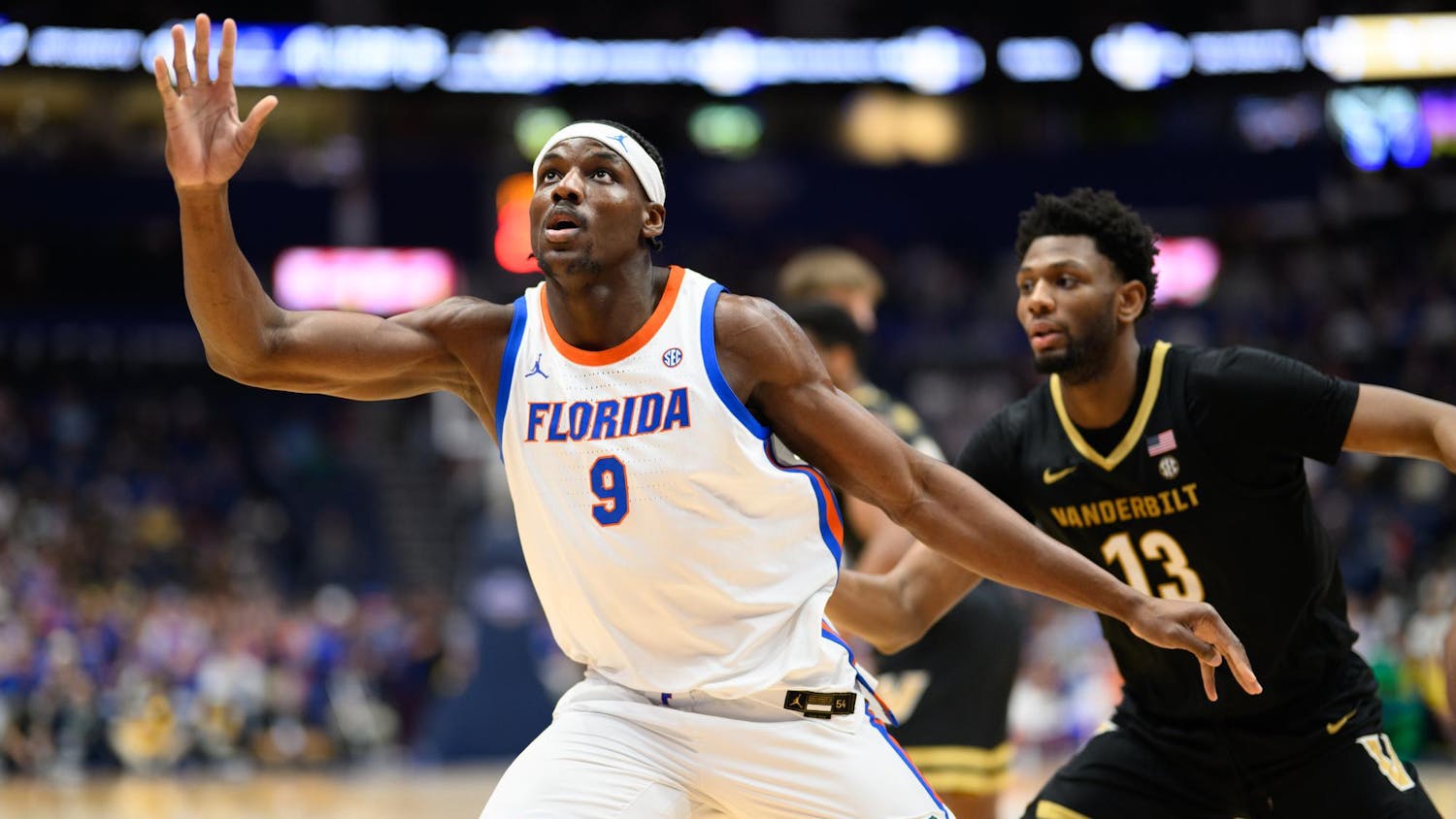 Florida center Rueben Chinyelu (9) move to the ball during the first half of an SEC Men's Basketball Tournament semifinal game against Vanderbilt, Saturday, March 14, 2026, in Nashville, Tenn.