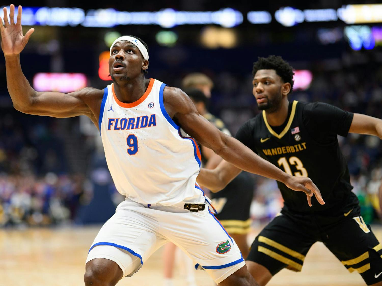 Florida center Rueben Chinyelu (9) move to the ball during the first half of an SEC Men's Basketball Tournament semifinal game against Vanderbilt, Saturday, March 14, 2026, in Nashville, Tenn.