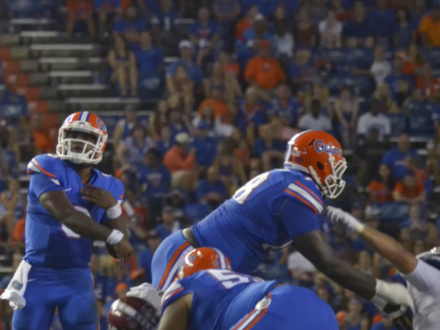 UF quarterback Treon Harris passes during Florida's 61-13 win against New Mexico State on Saturday at Ben Hill Griffin Stadium.