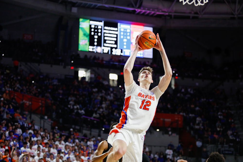 <p>Florida&#x27;s Colin Castleton goes up for a shot during a Nov. 14 game against Florida State. The center scored a game-high 19 points Wednesday against Alabama. </p>