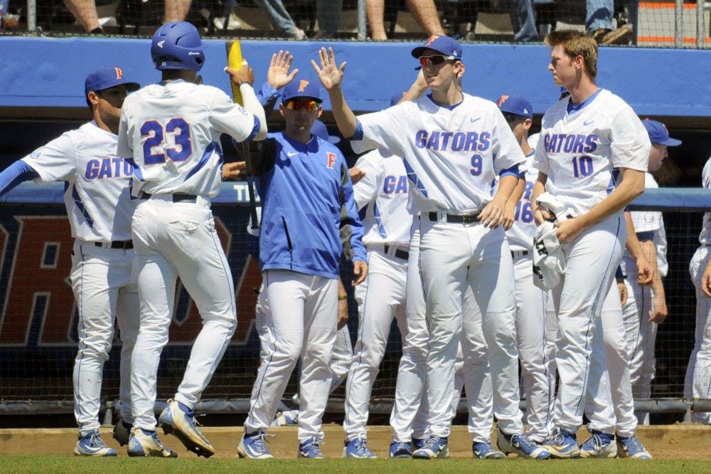 <p>Florida players celebrate during the team's 10-7 win over Texas A&amp;M on April 3, 2016, at McKethan Stadium.</p>