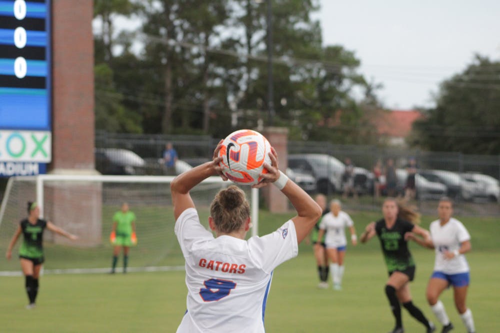 Florida junior defender Josie Curtis throws the ball into play during the Gators' match against South Florida Sept. 1, 2021. 