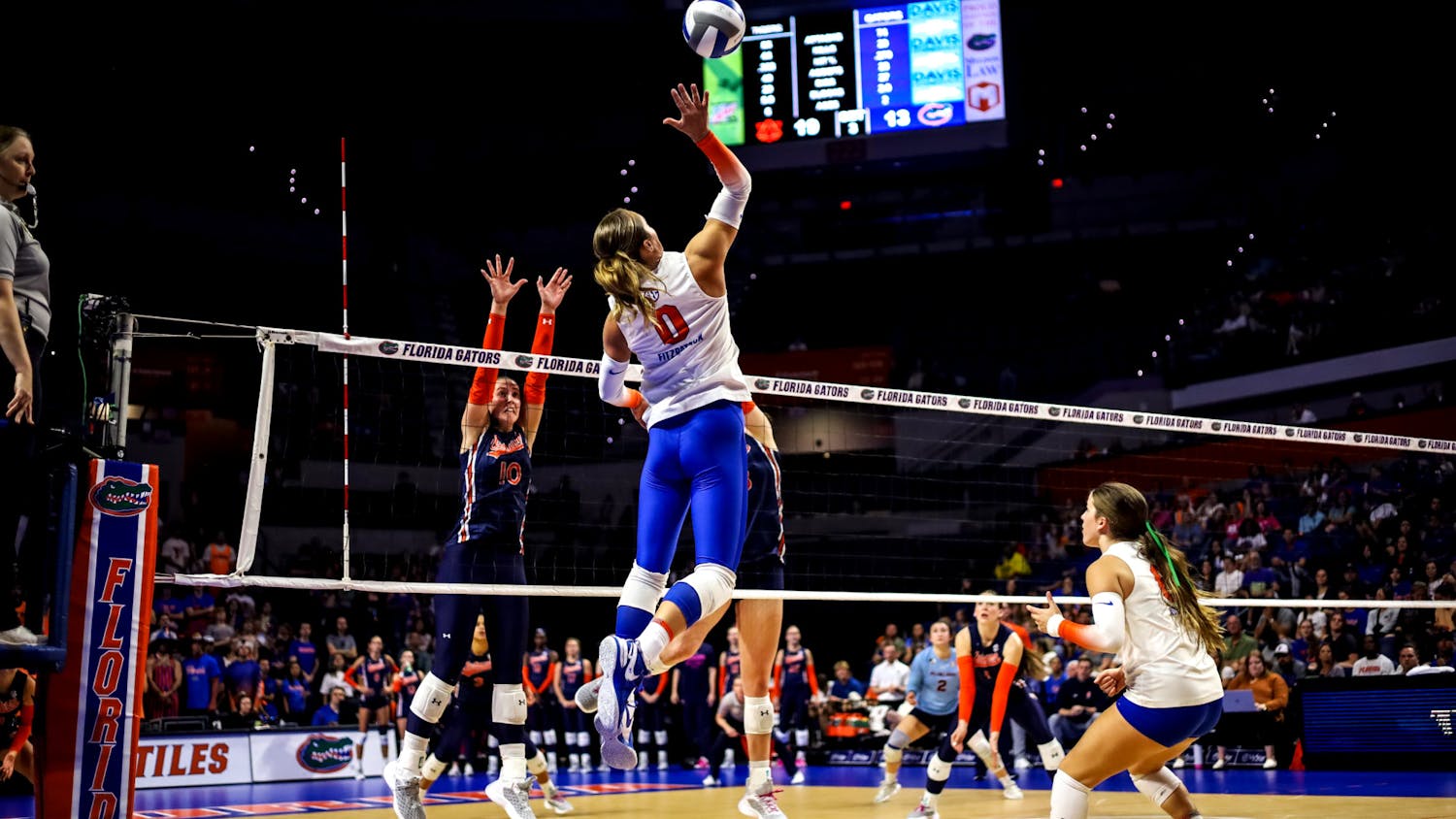 Senior outside hitter AC Fitzpatrick hits the ball in the Gators' 3-0 loss against the Auburn Tigers on Friday, Oct. 6, 2023.