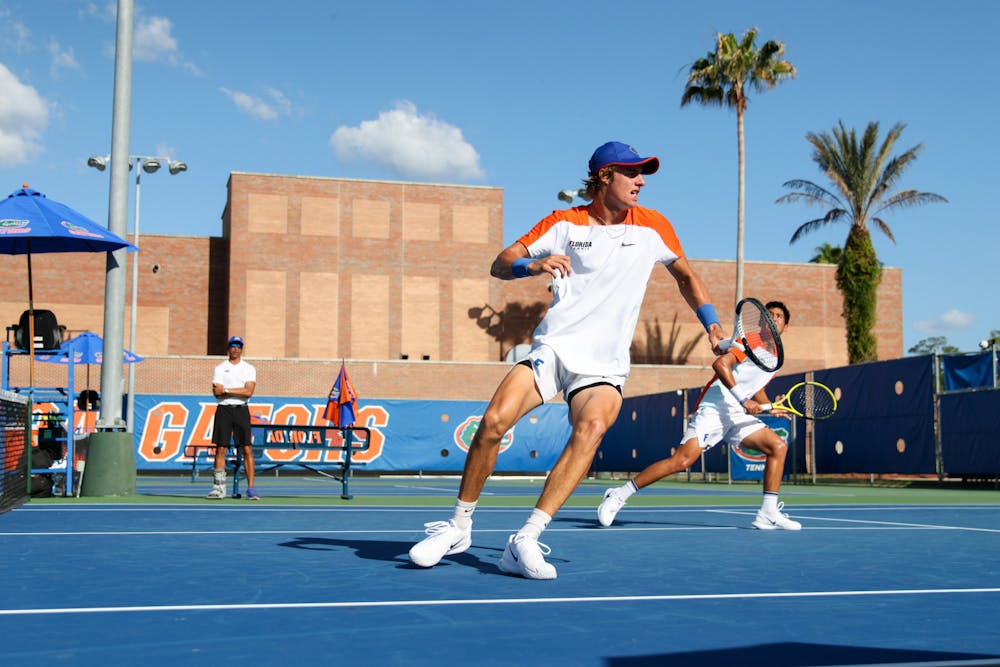 Florida sophomore Nate Bonetto (left) and freshman Tanapatt Nirundorn (right) compete in their doubles match during the Gators' 6-1 win over the Arkansas Razorbacks Friday, March 24, 2023.
