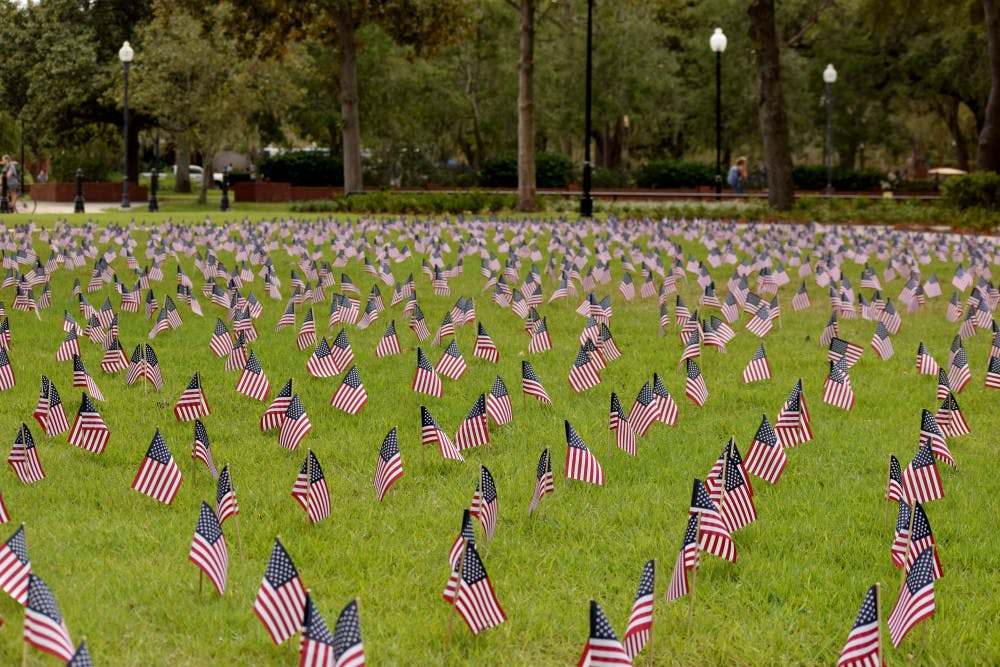 An array of flags decorates the Plaza of the Americas on Thursday. The Young Americans for Freedom group put down a flag for each victim of 9/11.