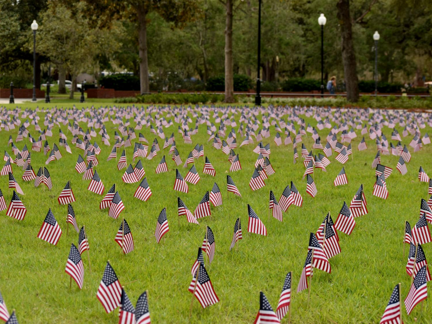 An array of flags decorates the Plaza of the Americas on Thursday. The Young Americans for Freedom group put down a flag for each victim of 9/11.