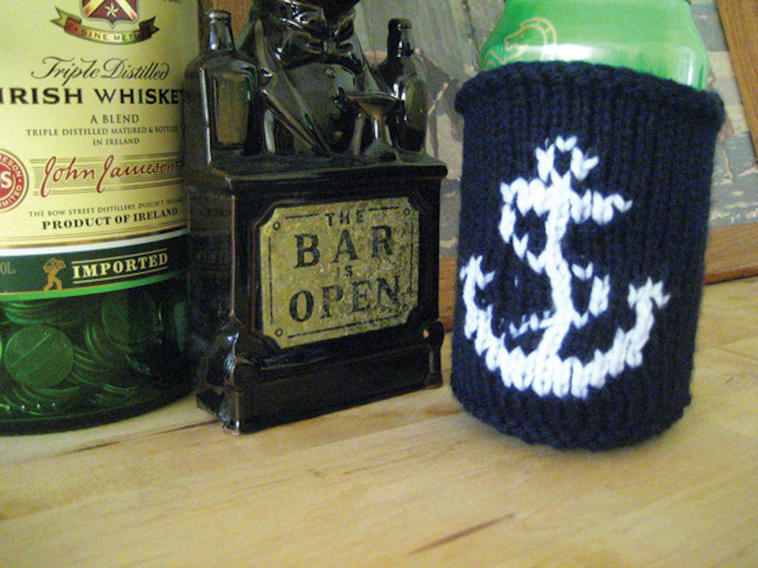 Mary Iserman of Knit At The Bar makes knitted items like this anchor coozie. Iserman will be one of the artists featured at the GLAM Indie Craft Show on Sunday. See story, page 16.